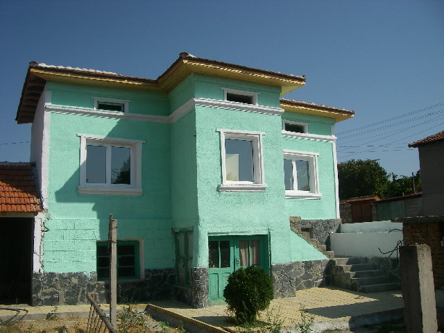 къща